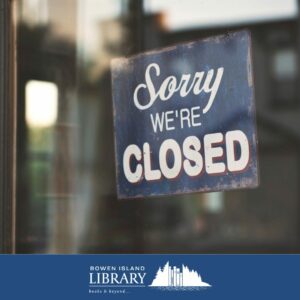 photo of a closed sign in a glass door that says "sorry we're closed" with white writing on dark blue.