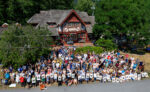 large group photo in front of library