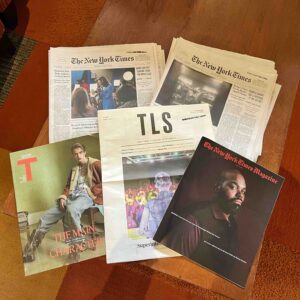 newspapers on a coffee table in the library